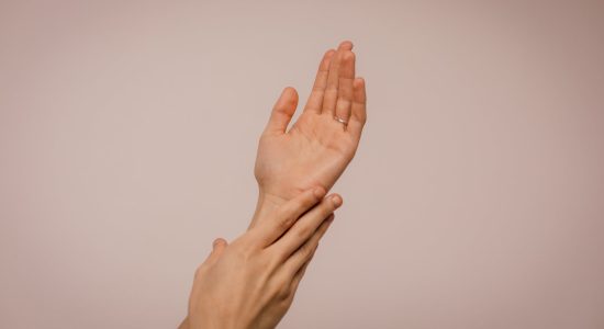person touching hand